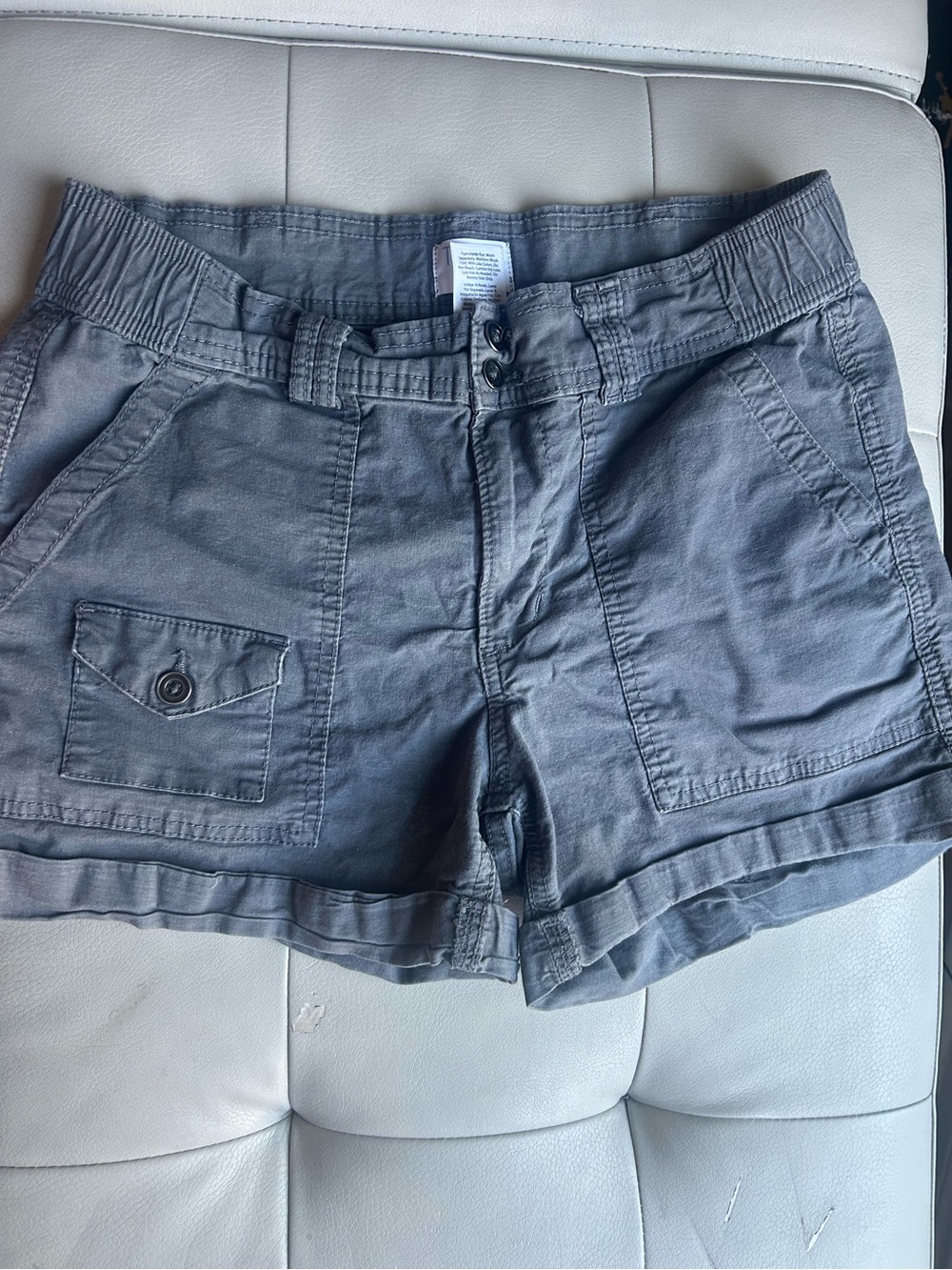 Women’s size 4, gray cargo shorts.